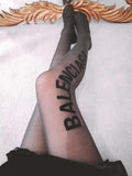 Balenciaga single-sided flocked lettering semi-transparent black pantyhose