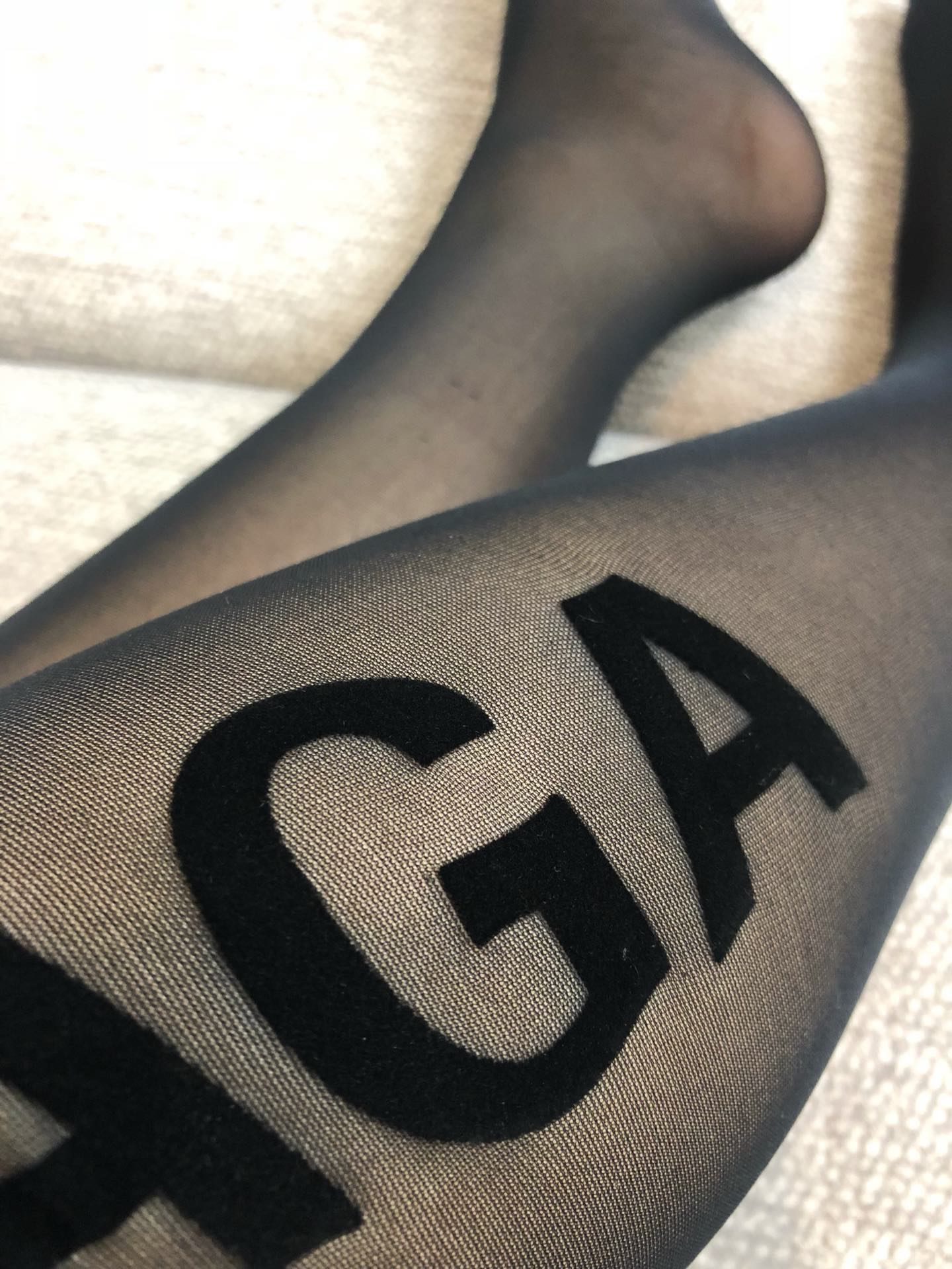 Balenciaga single-sided flocked lettering semi-transparent black pantyhose