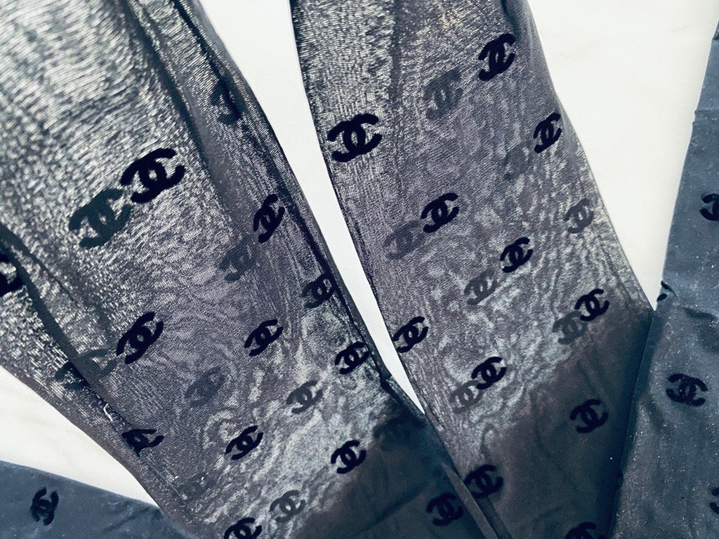CC high-end flocked logo haute couture pantyhose