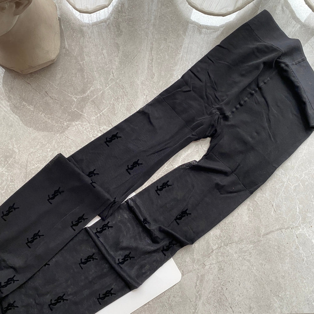 YSL flocked logo haute couture black pantyhose